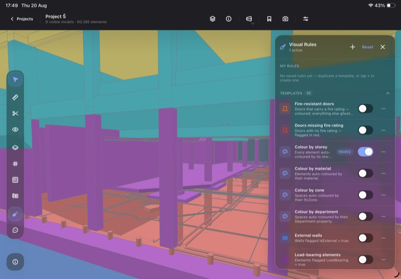 A federated model coloured by storey with the Visual Rules panel open
